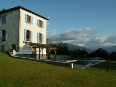 The back of the property with swimming pool and views of the Pyrenees mountains